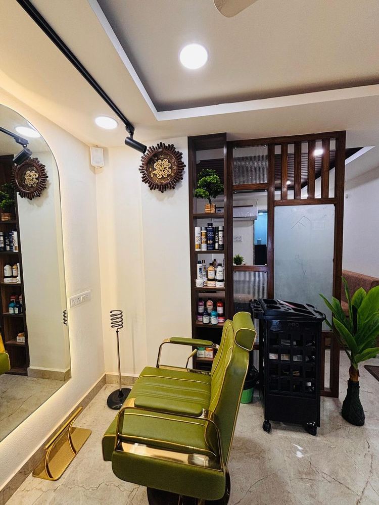Olive styling chair and arched mirror at the Shine On styling station